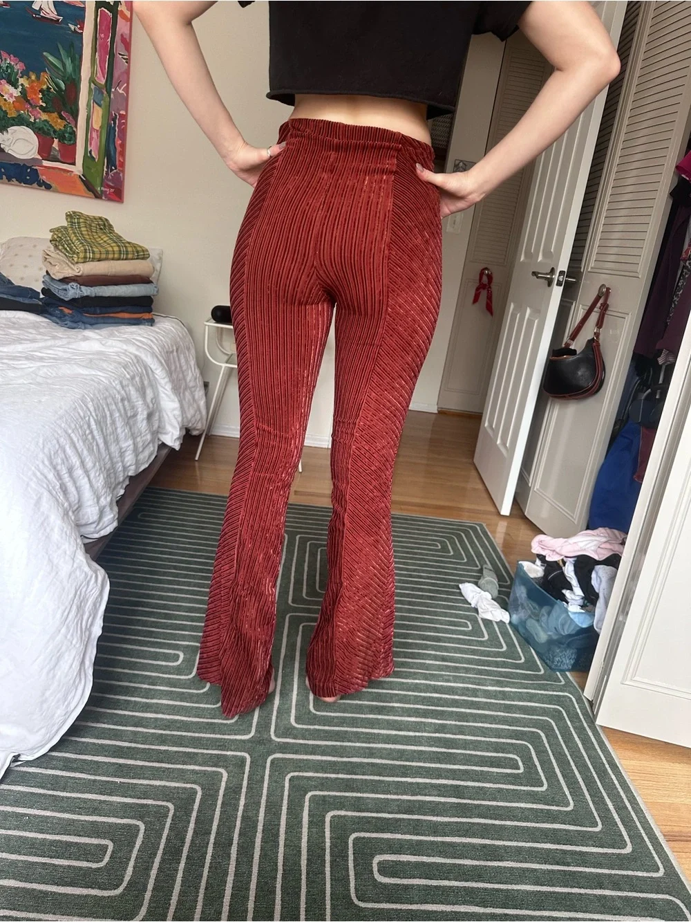 Free People Ribbed Velvet Flare Pants in Rust Red